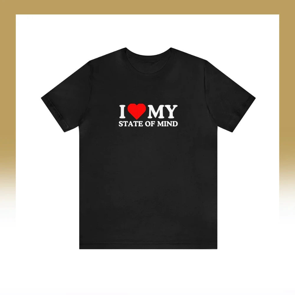 A black t-shirt with the uplifting quote "i ❤️ my state of mind" printed on it, where the heart symbol represents love.